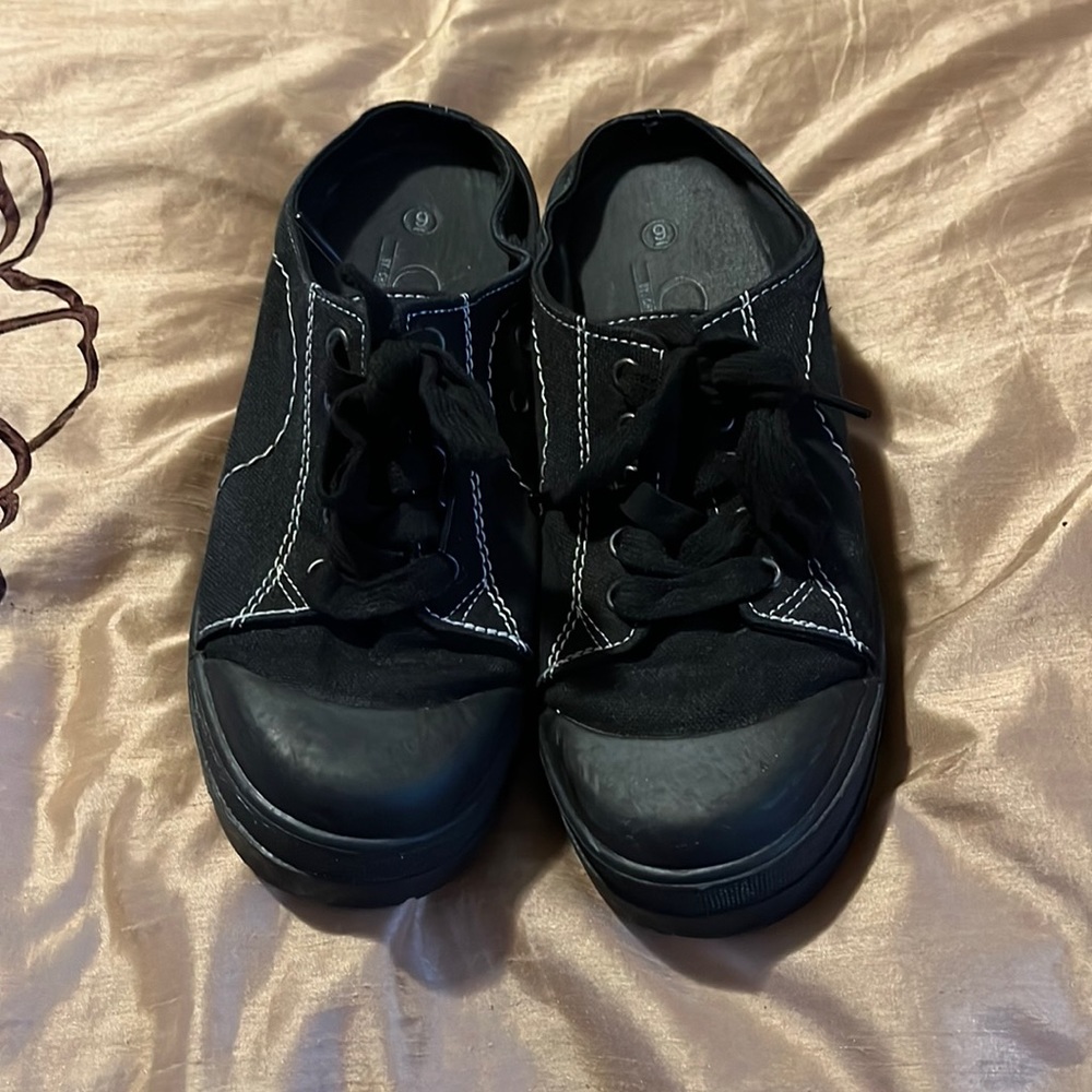 Black sneaker mules